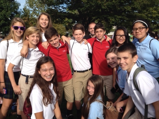 Students from St. James School in Falls Church, Va., await the Pope